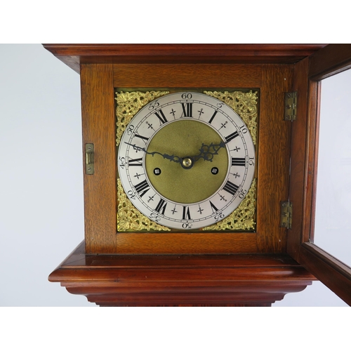 1185 - A 20th century eight day rosewood and inlaid dwarf longcase clock, the square hood with spiral twist... 