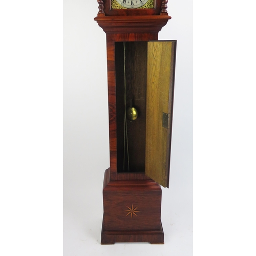 1185 - A 20th century eight day rosewood and inlaid dwarf longcase clock, the square hood with spiral twist... 