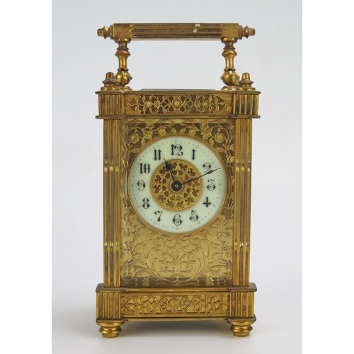 1190 - A late 19th century French gilt brass carriage timepiece, with 5cm ivorine Arabic chapter ring withi... 