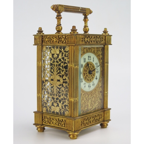 1190 - A late 19th century French gilt brass carriage timepiece, with 5cm ivorine Arabic chapter ring withi... 