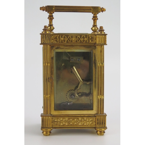 1190 - A late 19th century French gilt brass carriage timepiece, with 5cm ivorine Arabic chapter ring withi... 