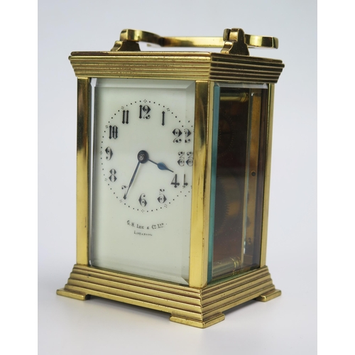 1191 - A lacquered brass carriage timepiece, with 6cm ivorine Arabic dial, the movement with lever platform... 