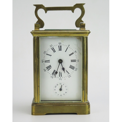 1192 - A lacquered brass carriage clock, the 6cm Roman dial with subsidiary alarm dial, the movement with p... 