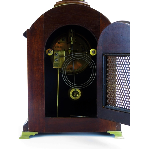 1193 - W R Bullen, Norwich, a mahogany Georgian style bracket clock, of arched outline with 11cm Roman dial... 