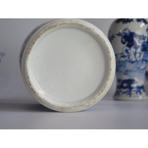 1220 - A Chinese blue and white vase of ovoid outline with allover foliate decoration33cm high, a pair of s... 