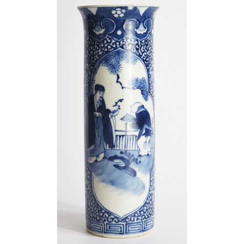 1224 - A Chinese blue and white sleeve vase, decorated with figures in a garden landscape, bears four chara... 