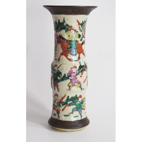 1225 - A Cantonese crackle glaze sleeve vase, decorated with mounted warriors and foot soldiers, with impre... 