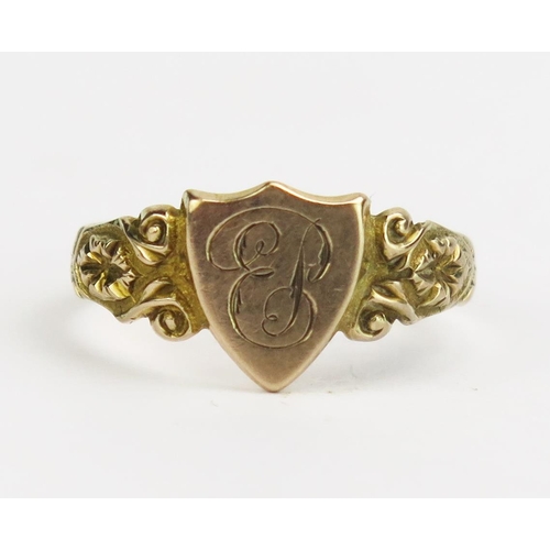 124 - An Antique 9ct Gold Shield Shaped Ring engraved with EP monogram and decorative shoulders, size P, B... 