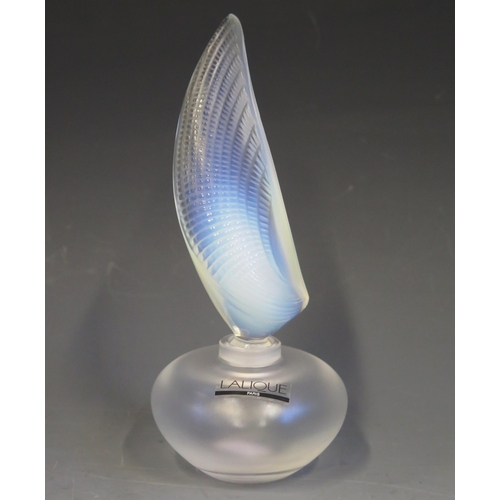 1241 - A Lalique glass 'Coquillage' pattern scent bottle, signed to the base Lalique, France, 15.5cm high.