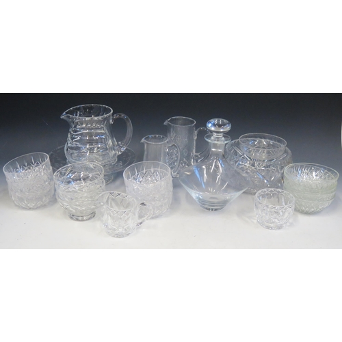 1243 - A collection of assorted cut glass wares, includes trumpet-shaped vase, decanters, sundae dishes, co... 