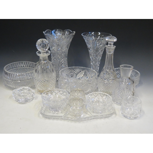 1243 - A collection of assorted cut glass wares, includes trumpet-shaped vase, decanters, sundae dishes, co... 