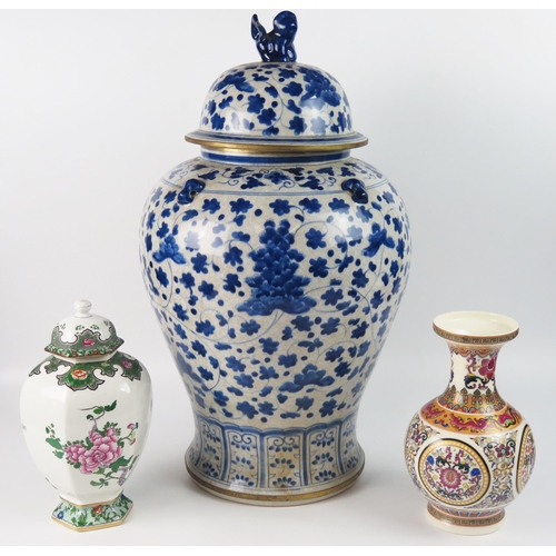 1252 - A large modern Chinese blue and white vase and cover, of ovoid outline, the domed cover surmounted b... 