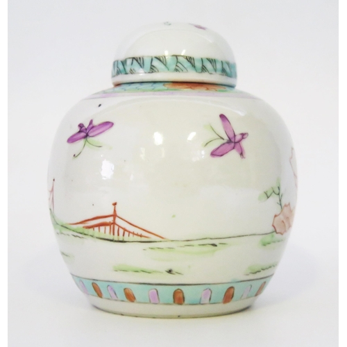 1257 - A Chinese Famille verte decorated ginger jar and cover, decorated with figures in a garden landscape... 