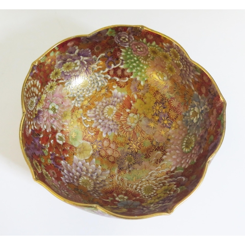 1259 - A pair of Japanese Satsuma millefiori bowls of lobed outline, densely decorated in enamels, signed '... 