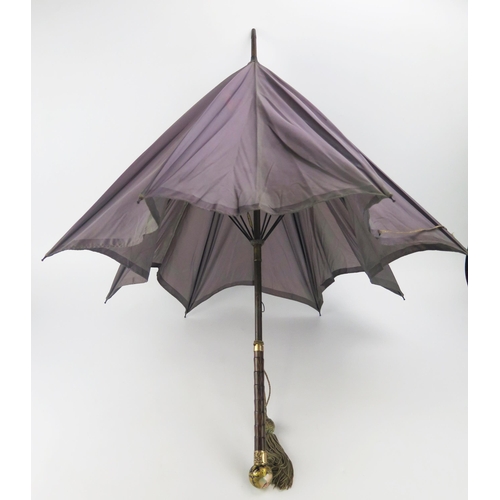 1273 - A good quality Victorian parasol, with pale purple canopy, having a gilt metal mounted faux zebra wo... 