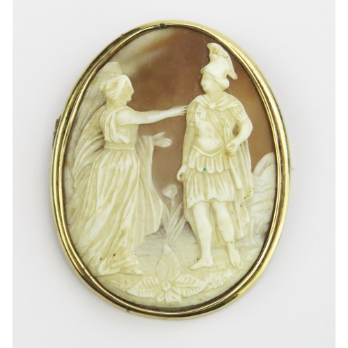 128 - A 19th Century Shell Cameo Brooch in a precious yellow metal setting, decorated with a classical sce... 