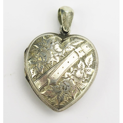 129 - A Victorian Precious White Metal Heart Shaped Locket Pendant with chased foliate decoration, 41.7mm ... 