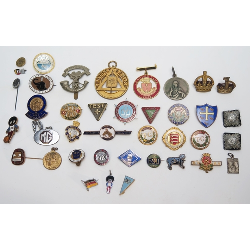 1296 - A collection of assorted enamel lapel and other badges, Masonic jewel etc.