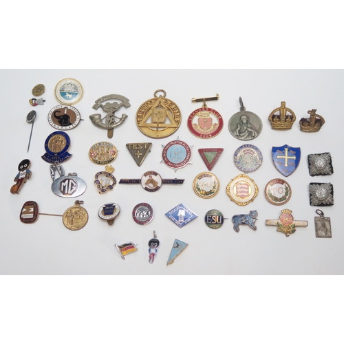 1296 - A collection of assorted enamel lapel and other badges, Masonic jewel etc.