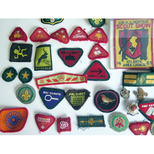 1309 - A collection of Boy Scout cloth badges, leather belt,