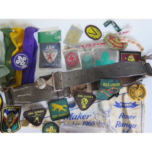 1309 - A collection of Boy Scout cloth badges, leather belt,