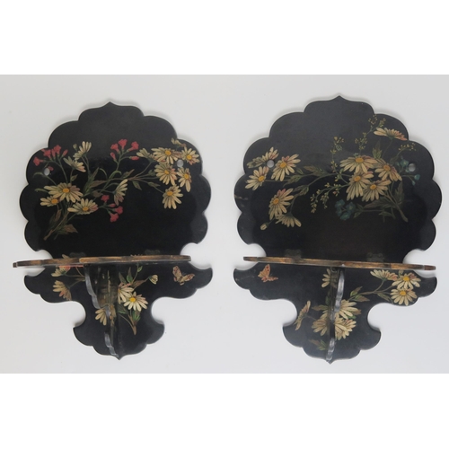 1318 - A pair of Victorian papier mache folding wall brackets, with floral decoration to a black ground, th... 