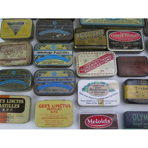 1323 - A collection of assorted pastille tins by various companies, a metal First aid tin etc.