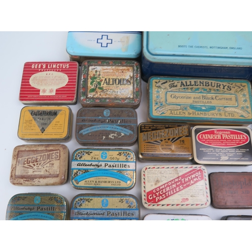 1323 - A collection of assorted pastille tins by various companies, a metal First aid tin etc.