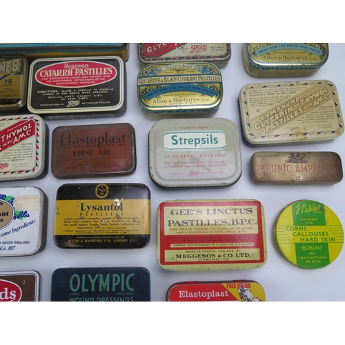 1323 - A collection of assorted pastille tins by various companies, a metal First aid tin etc.