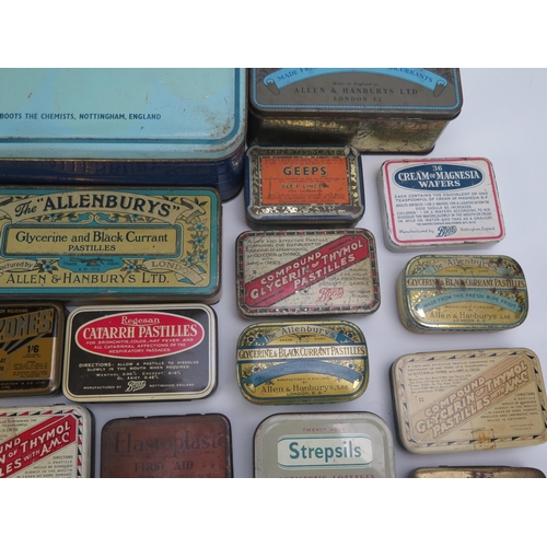 1323 - A collection of assorted pastille tins by various companies, a metal First aid tin etc.