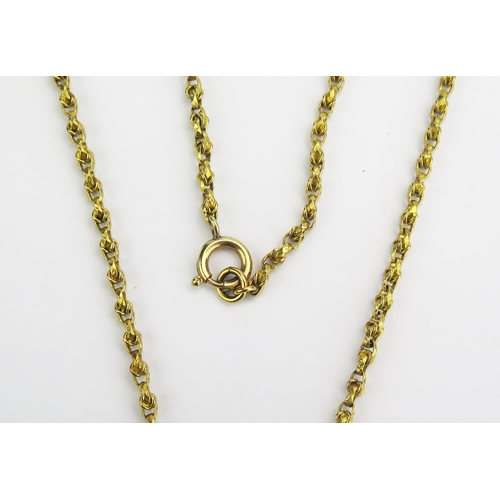 133 - An Antique Gilt Metal Guard Chain, 50