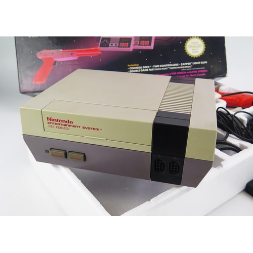 1357 - Nintendo Action Set NES Entertainment System with Super Mario Bros Duck Hunt, Super Off-Road, Termin... 