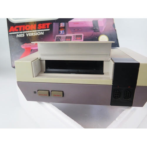 1357 - Nintendo Action Set NES Entertainment System with Super Mario Bros Duck Hunt, Super Off-Road, Termin... 