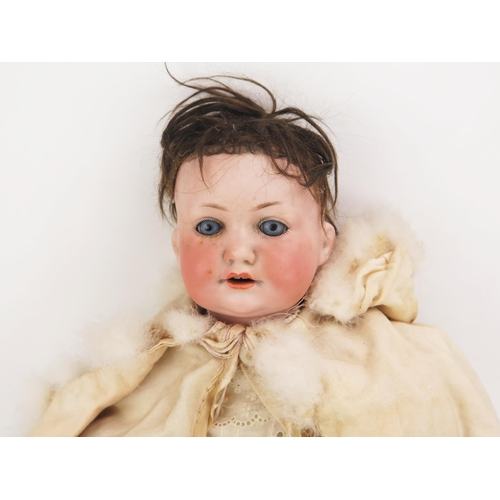 1372 - Armand & Marseille Bisque Headed Doll with weighted blue glass eyes, open with two front teeth showi... 