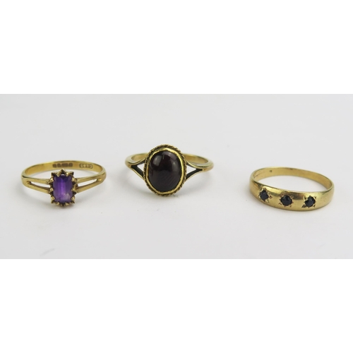 141 - A 9ct Gold and Amethyst Ring (8.1x5.8mm head, hallmarked, size M.5, 1.39g), a 9ct gold and cabochon ... 