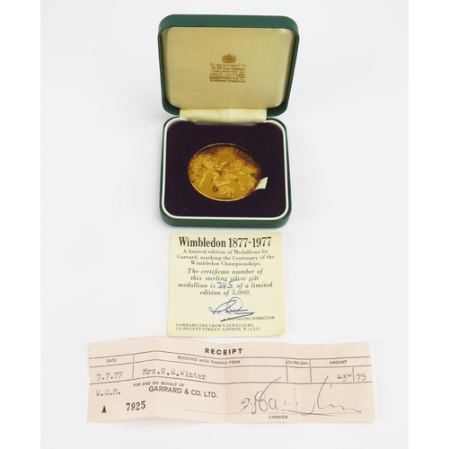 1425 - A Wimbledon 1877-1977 Silver Gilt Medallion by Garrard. Boxed with COA