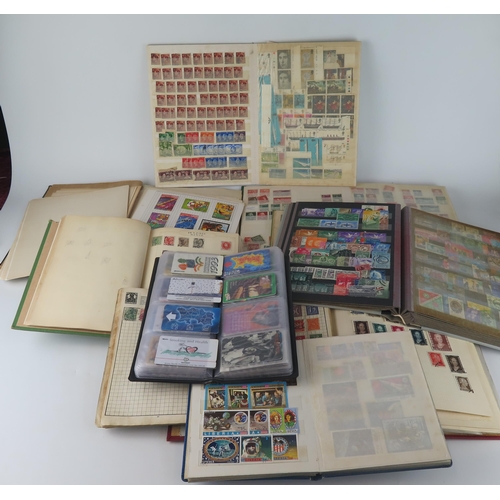 1454 - A Large Collection of World Stamps arranged in albums and stock books including a large quantity of ... 