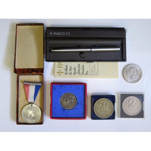 1626 - A Parker 25 ball-point pen, cased, together with commemorative medallions and crowns.  and medallion... 