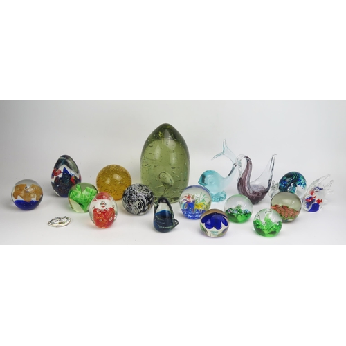 1639 - A green glass dump, 21cm high, together with assorted paperweights and glass ornaments.