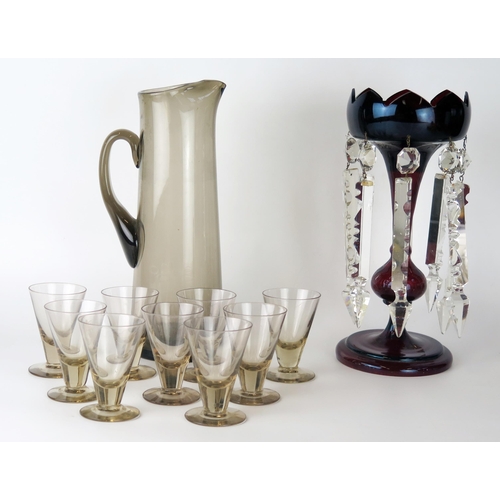 1641 - A Scandinavian  smoked glass cordial jug with nine matching tumblers, together with a ruby glass lus... 