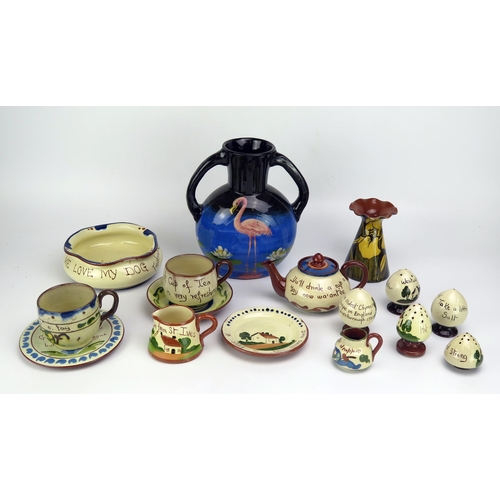 1642 - A collection of Torquay pottery wares, includes condiments, vases, teapot and bowls.