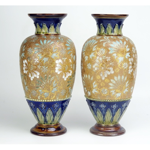 1648 - A pair of Royal Doulton vases, of ovoid form, with palmette decorated necks, and all-over floral dec... 