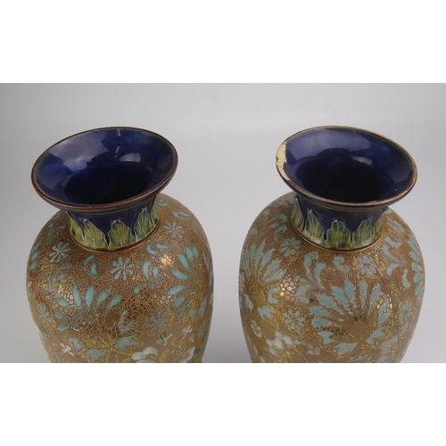 1648 - A pair of Royal Doulton vases, of ovoid form, with palmette decorated necks, and all-over floral dec... 