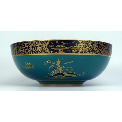 1650 - A Carlton ware fruit dish, decorated in the Chinoiserie taste with pagoda landscape, to a green grou... 