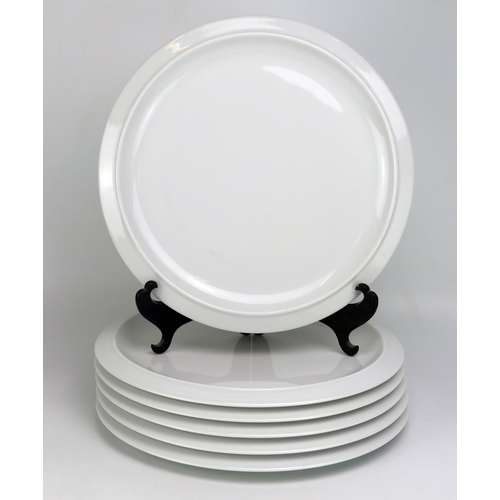 1651 - A set of six Alessi Tendentse catering plates, of plain circular form, 31cm diameter. (6).