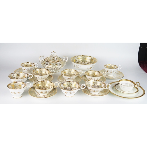 1659 - A Davenport part tea service, with gilt floral decoration, includes six cups, three coffee cups, fiv... 