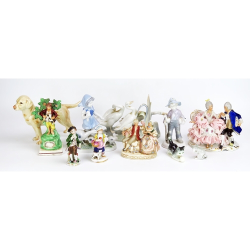 1660 - A collection of continental porcelain figurines, various factories, includes gallants and lady's, Go... 