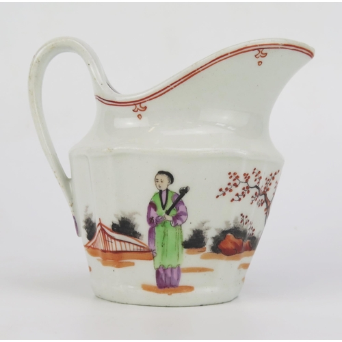 1664 - A late 18th century Newhall porcelain cream jug, with Chinoiserie painted decoration 10cm high.