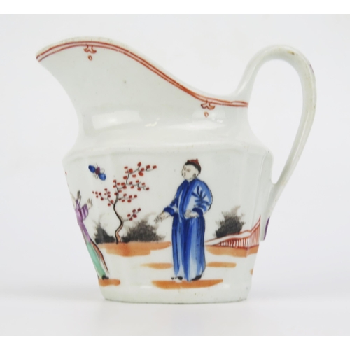 1664 - A late 18th century Newhall porcelain cream jug, with Chinoiserie painted decoration 10cm high.