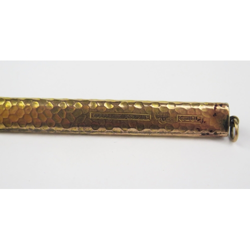 183 - A Planished Gold Telescopic Fob Pencil Holder with turquoise mounted button, London 1903, Goldsmiths... 